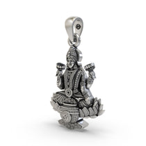 Angled profile of the sterling silver Lakshmi Maa Lotus Pendant, highlighting the intricate temple-style details.