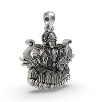 Close-up of the temple-style artistry on the Lakshmi Maa with Elephants pendant, handcrafted from 925 sterling silver.