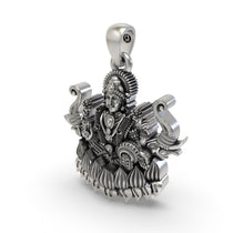 Detailed shot of the Lakshmi Maa with Elephants spiritual pendant in 925 silver, showcasing its unique finish.