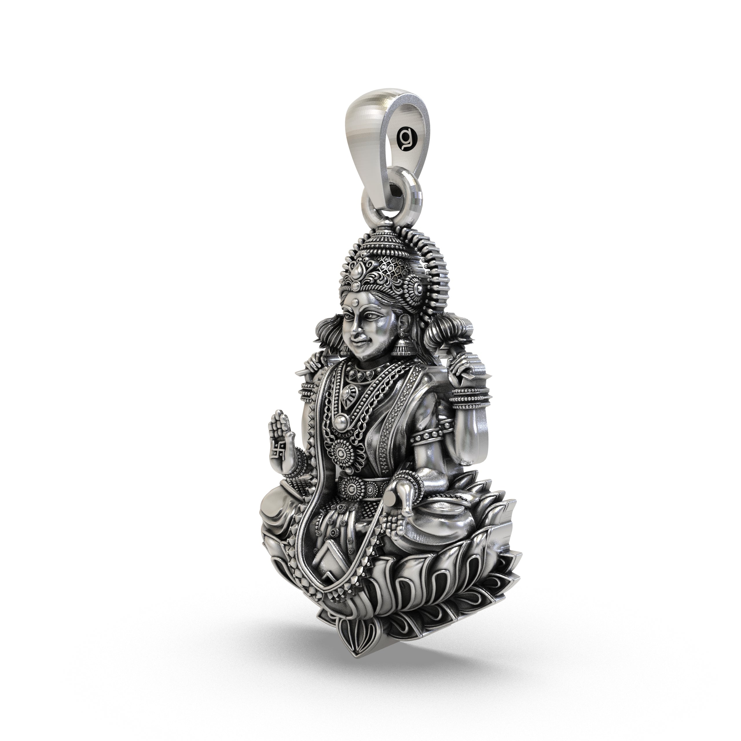Close-up detailing of the Mahalakshmi silver pendant showing intricate antique oxidized finish and carving.