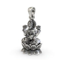 Close-up detail of the handmade 925 sterling silver Mahalakshmi pendant with antique oxidized finish.
