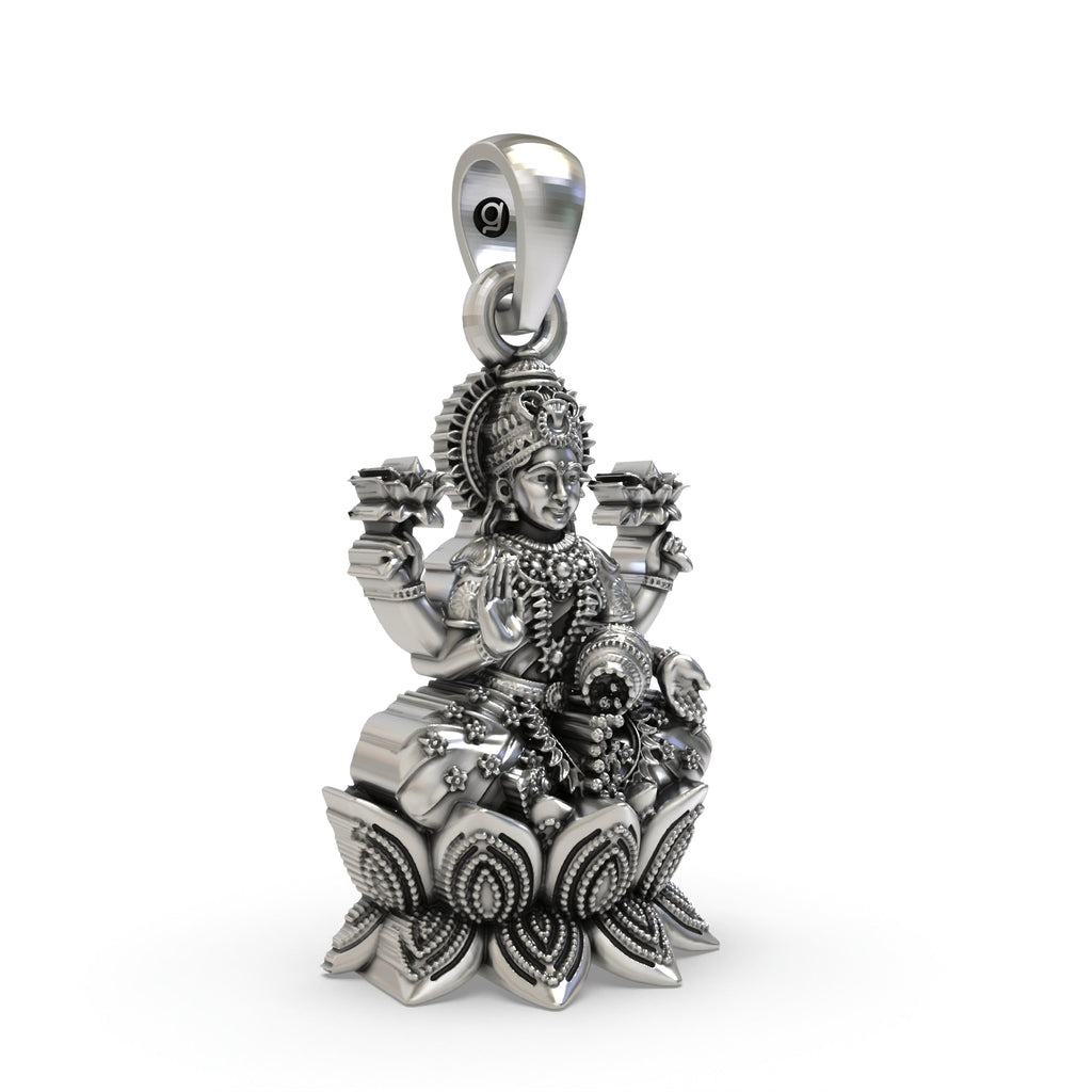 Side angle of the traditional silver temple jewelry Goddess Lakshmi pendant showing kalash details.