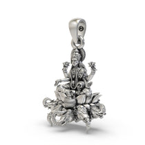 Close-up detail of the oxidized silver Gajalakshmi pendant showing intricate elephants and kalash.