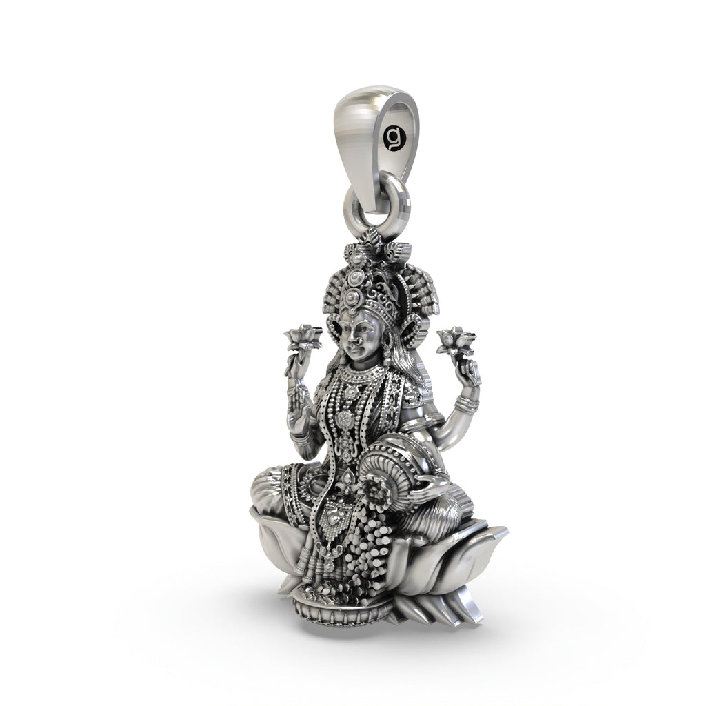 Close-up detail of the handcrafted 925 Silver Lakshmi Pendant highlighting the blessing mudra and coins.