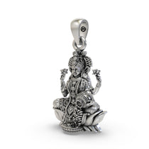Close-up detail of the handcrafted 925 Silver Lakshmi Pendant highlighting the blessing mudra and coins.