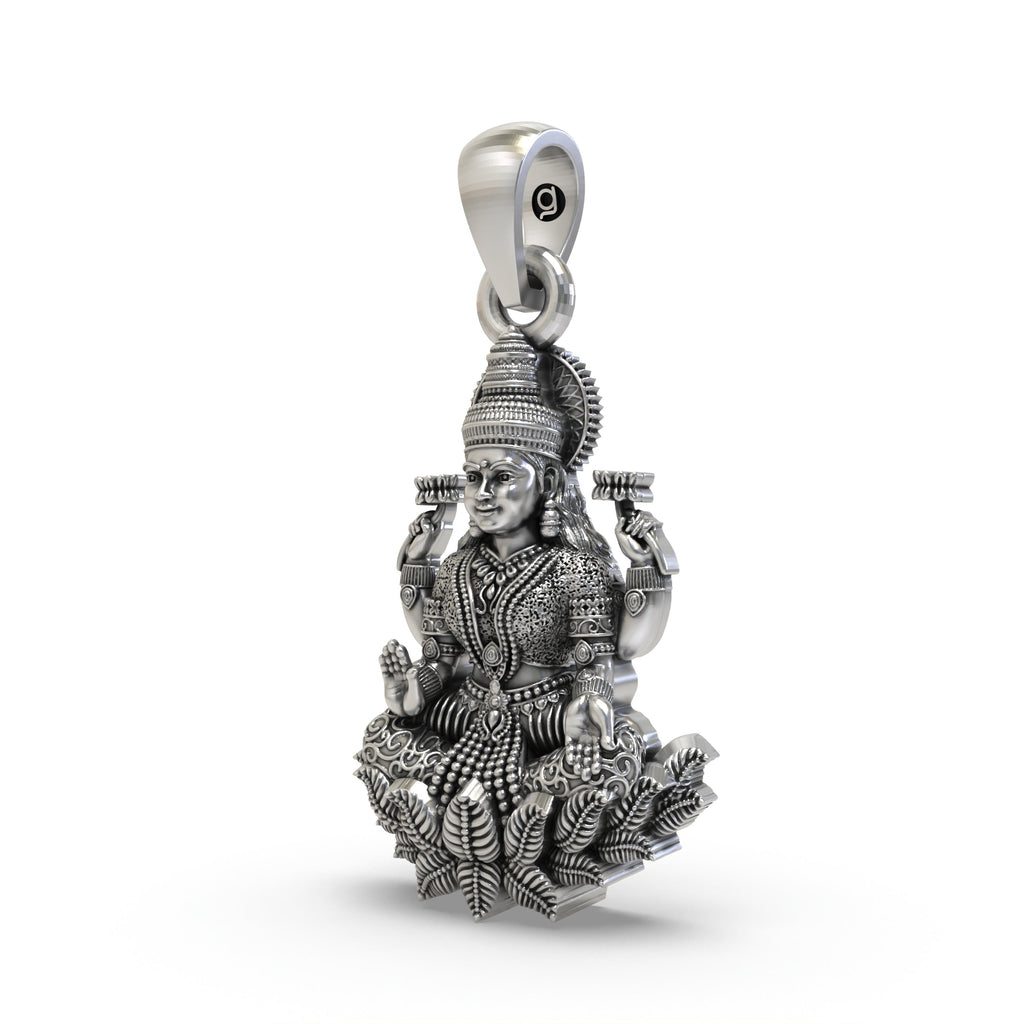 Close-up detail of the oxidized 925 sterling silver Mahalakshmi temple jewellery pendant.