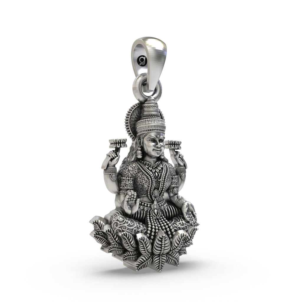 Side profile of the handcrafted silver Goddess Lakshmi pendant highlighting the intricate design.