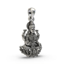 Side profile of the handcrafted silver Goddess Lakshmi pendant highlighting the intricate design.