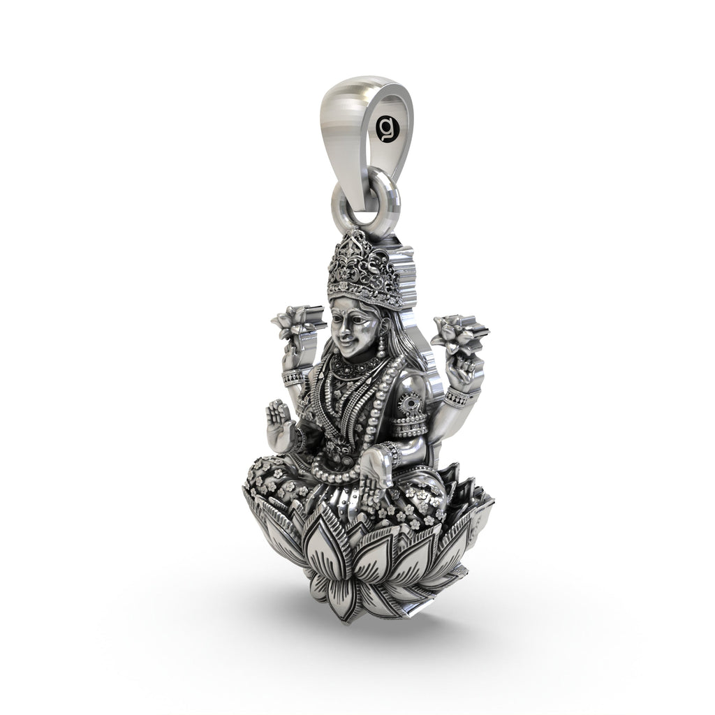 Close-up of the sterling silver Lakshmi pendant highlighting the blessing mudra.