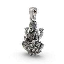 Close-up of the sterling silver Lakshmi pendant highlighting the blessing mudra.
