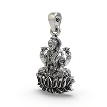 Close-up of Goddess Lakshmi on a lotus in this handcrafted 925 silver temple pendant by Alankar.