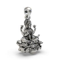 Side profile of the handmade silver Goddess Mahalakshmi temple jewellery pendant by Alankar.