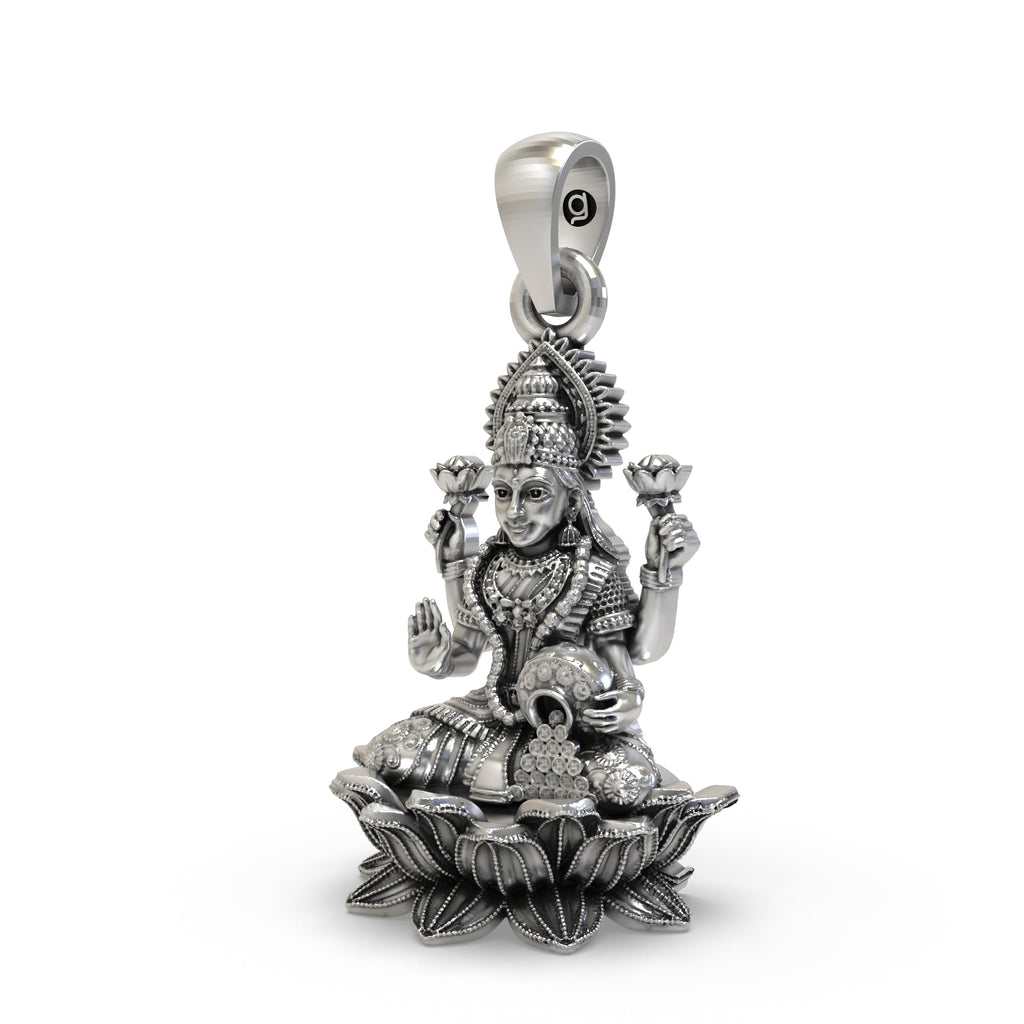 Close-up of the silver Lakshmi pendant showing Goddess Mahalakshmi on a lotus with blessing mudra.