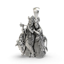 Front view of the 925 silver Radha Krishna pendant featuring intricate handmade details of the divine couple.