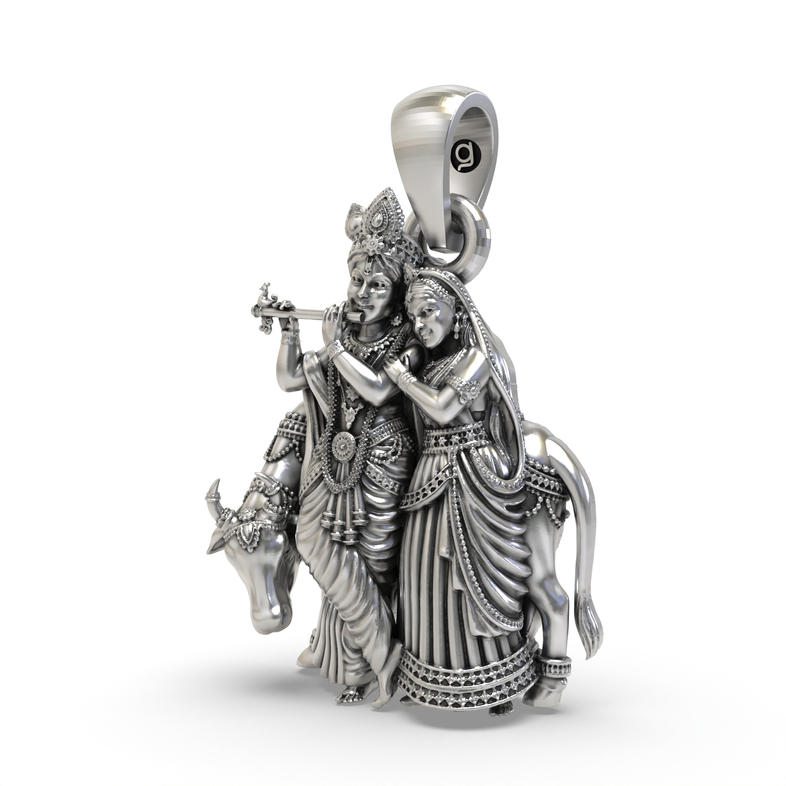 Close-up of the sterling silver Radha Krishna locket showing the sacred cow and Lord Krishna with his flute.