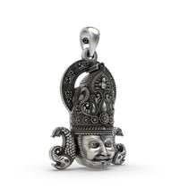 Angled view of the temple jewelry Khatu Shyam Ji silver pendant highlighting floral motifs.