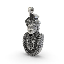 Close-up of the handcrafted silver Mahakal pendant showing the ornate mukut and oxidized temple finish.