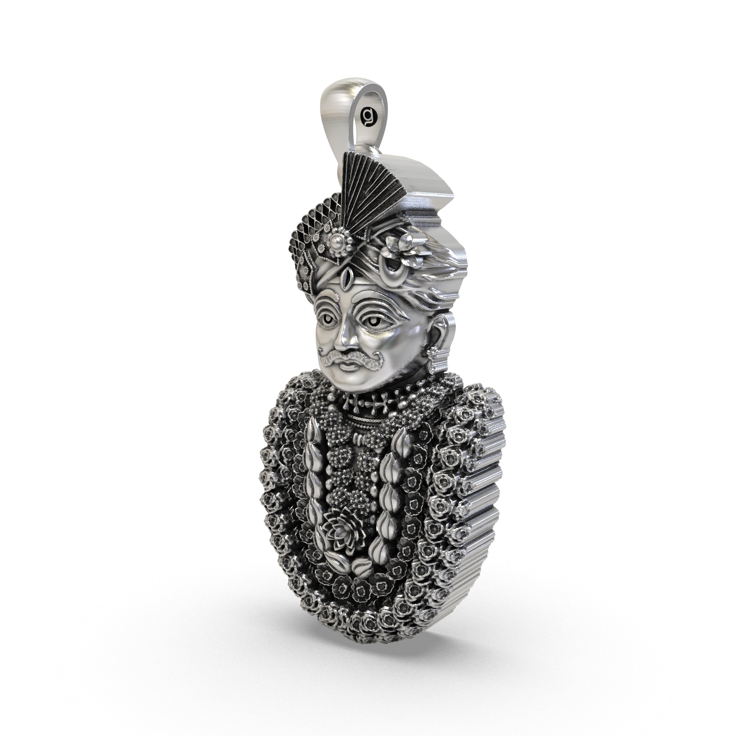 Close-up of the handcrafted silver Mahakal pendant showing the ornate mukut and oxidized temple finish.