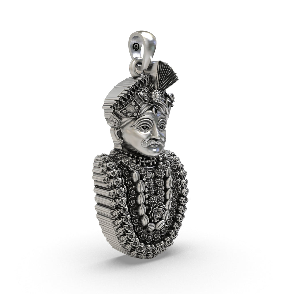 Angled view of the solid silver Lord Shiva Mahakal pendant highlighting the durable bail design.