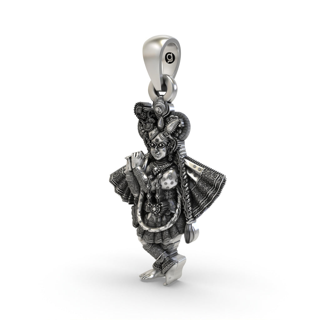 Close-up detail of the oxidized silver Banke Bihari Ji idol in tribhangi pose