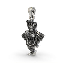 Close-up detail of the oxidized silver Banke Bihari Ji idol in tribhangi pose