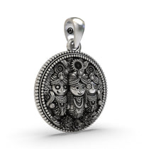 Antique oxidized finish highlighted on the temple-inspired beaded border of the pendant.