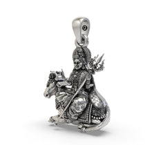 Close-up detail showing the intricate micro-carving and Trishul on this Mahagauri silver temple pendant.