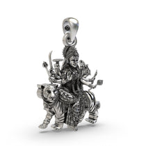 Side profile of the antique-oxidized 925 silver Durga Maa pendant featuring the Trishul and mudras.