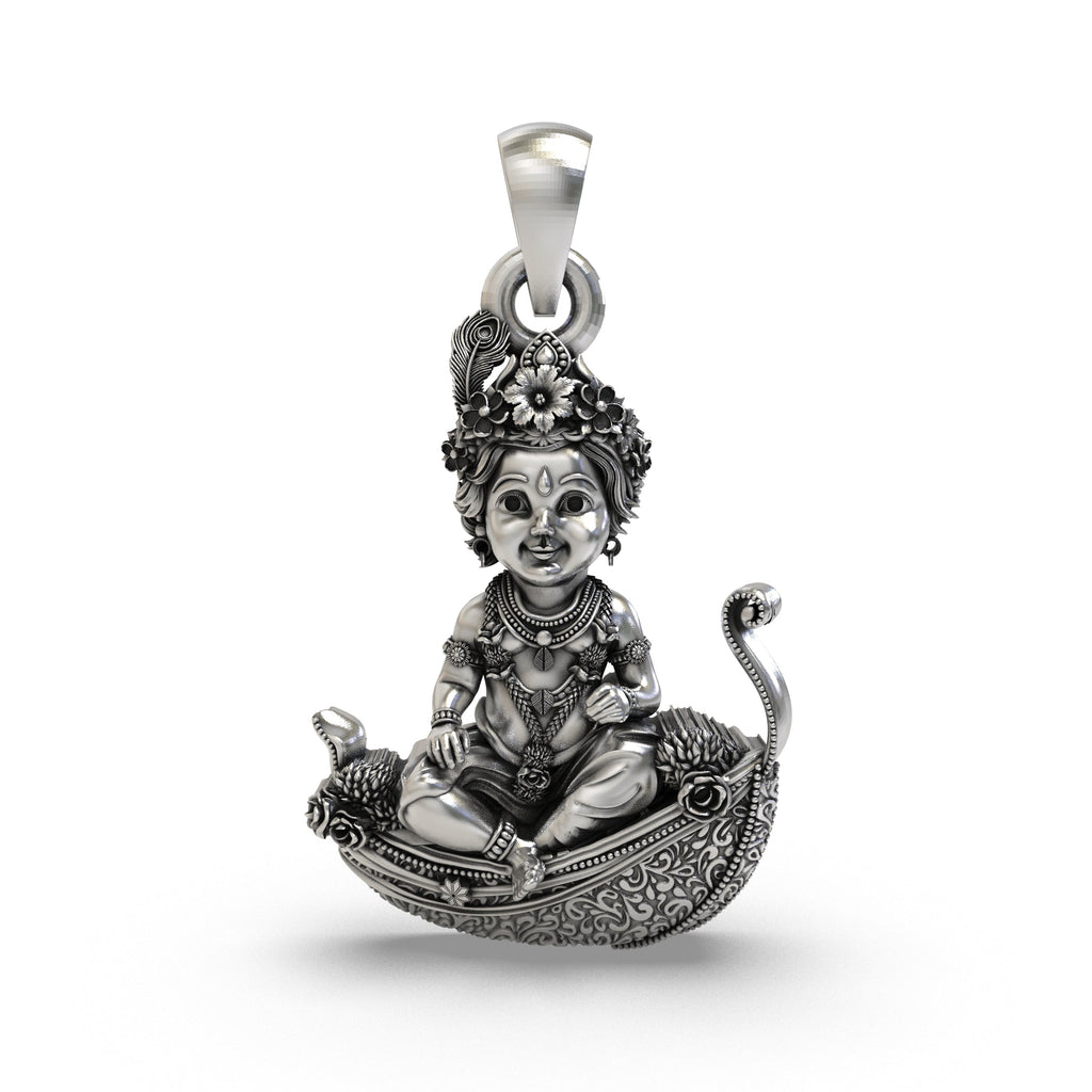 Front view of 925 Silver Bal Krishna pendant on a peepal leaf with antique oxidized finish.