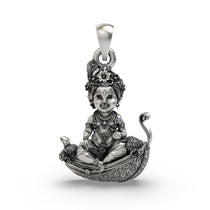 Front view of 925 Silver Bal Krishna pendant on a peepal leaf with antique oxidized finish.