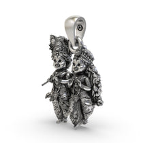 Close-up of the antique-oxidized finish on the 925 Silver Radha Krishna spiritual pendant.