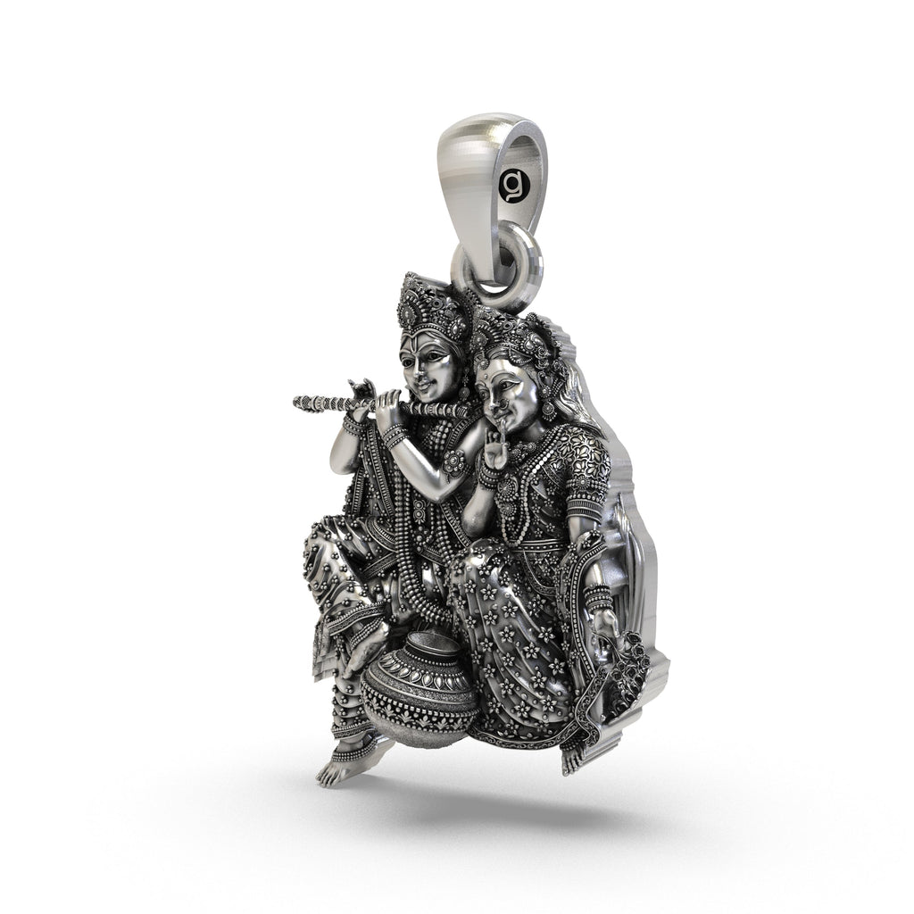 Close-up of the 925 Sterling Silver Radha Krishna Pendant showing the flute and matki design.