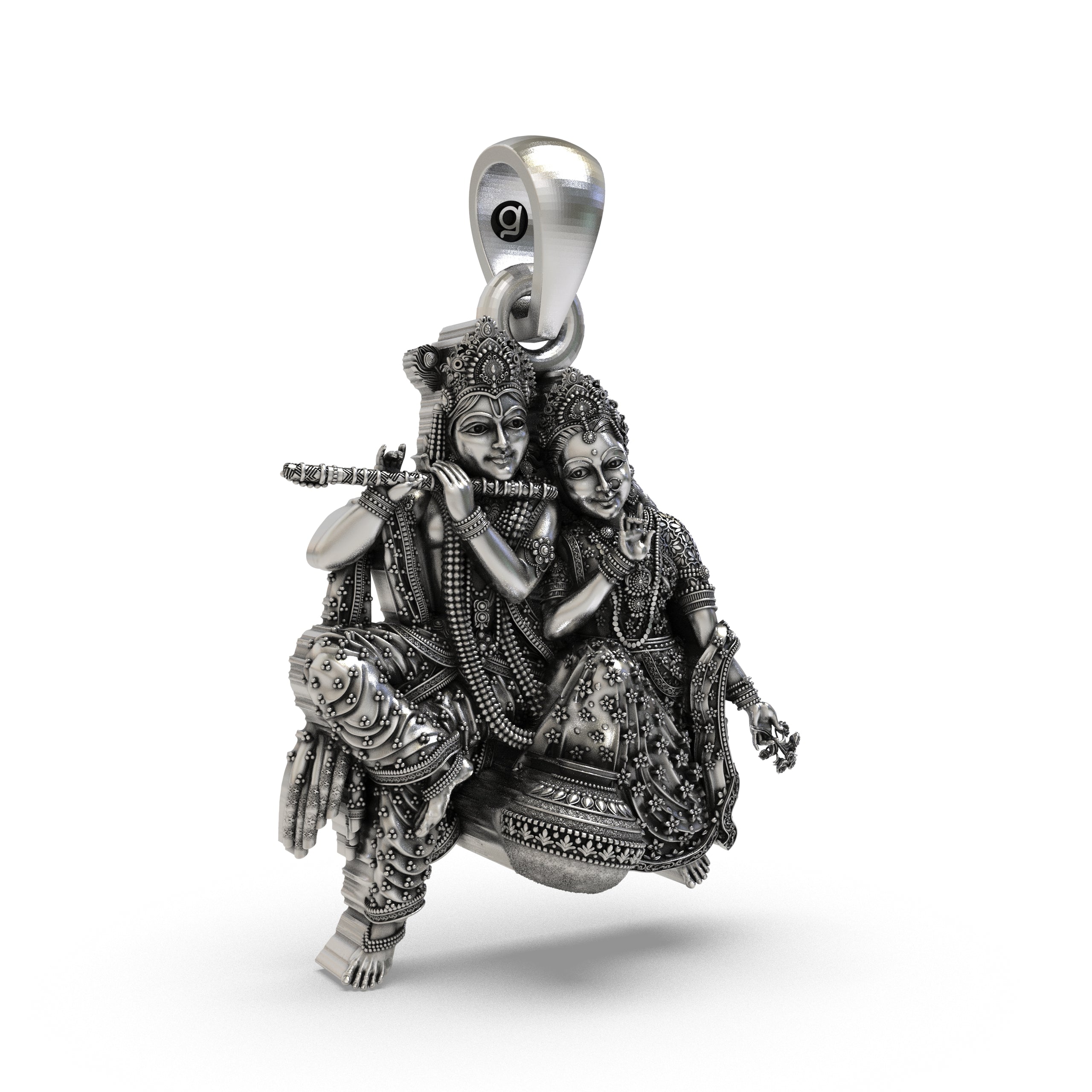 Side profile view highlighting the high-relief carving of the Silver Radha Krishna Idol Necklace.