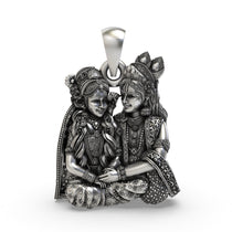Front view of the 925 sterling silver Radha Krishna seated love pendant with oxidized finish.