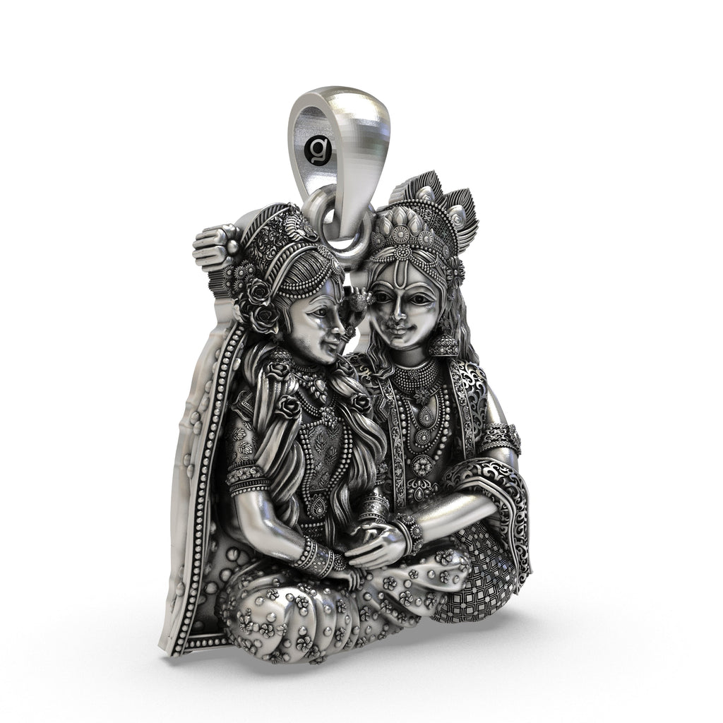 Side angle of the 925 silver Radha Krishna devotional pendant highlighting the high-relief carving.