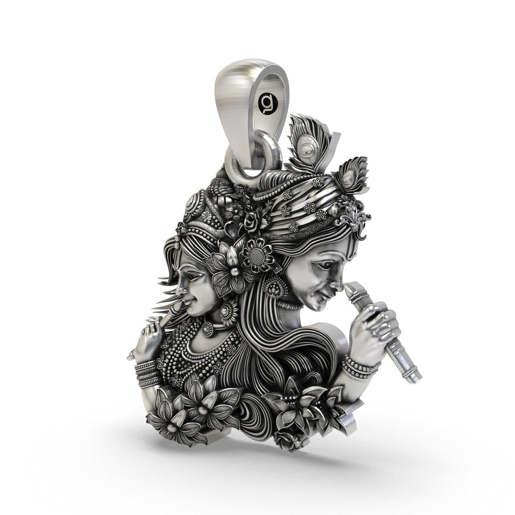 Close-up of the sterling silver Radha Krishna devotional idol necklace highlighting the oxidized finish.