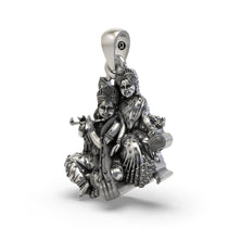 Close-up detail showing the antique oxidized finish on the handcrafted Radha Krishna silver necklace.