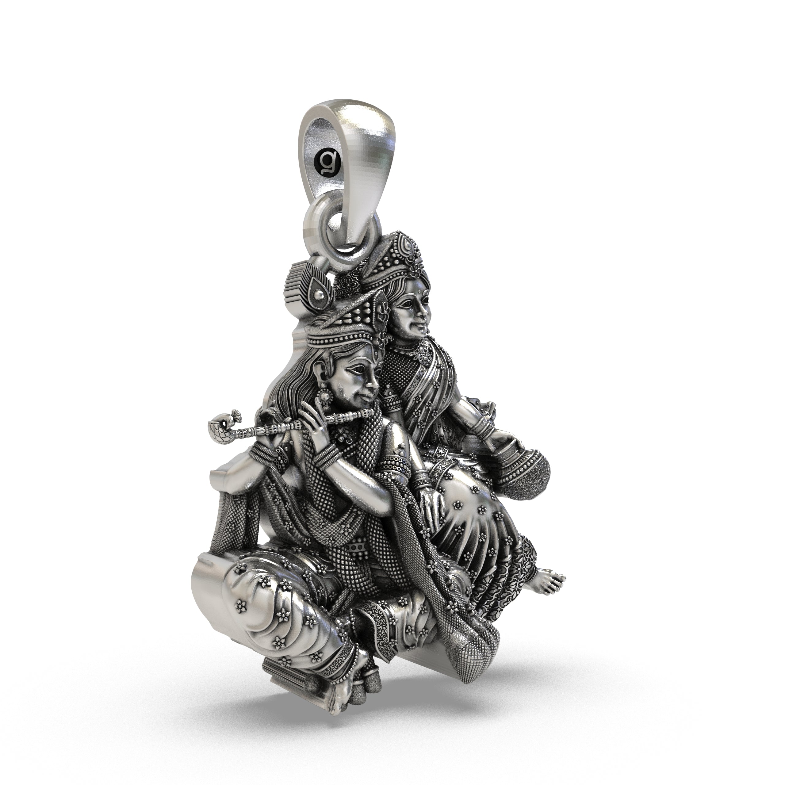 Side profile of the Vrindavan idol pendant highlighting the intricate mukut and garments in 925 silver.