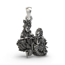 Front view of 925 sterling silver Radha Krishna pendant with antique oxidized finish.