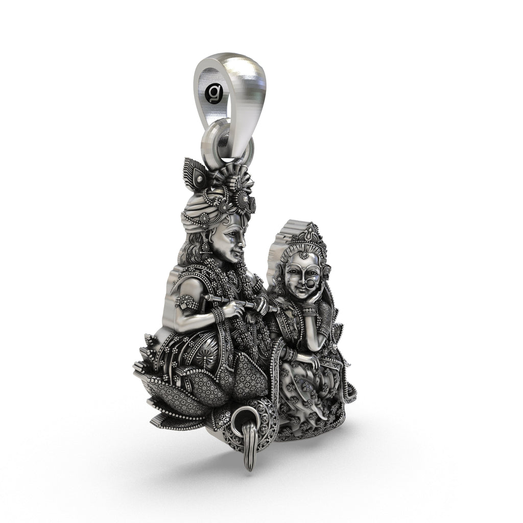 Side profile of solid 925 silver Radha Krishna necklace pendant highlighting the high relief.