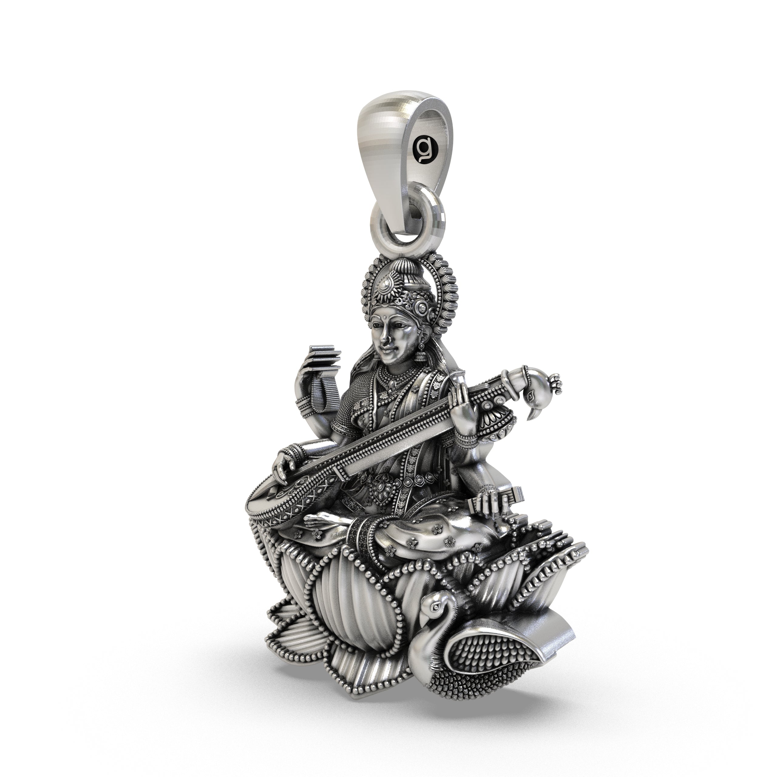 Close-up of the antique oxidized finish on the sterling silver Saraswati idol necklace.