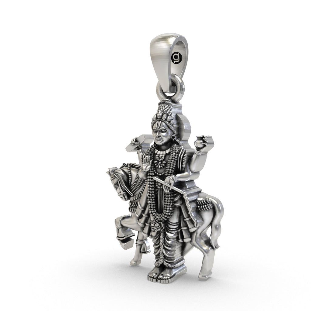 Close-up detail of the oxidized finish on the handcrafted silver Shukra Deva idol necklace by Alankar.