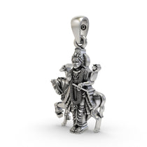 Close-up detail of the oxidized finish on the handcrafted silver Shukra Deva idol necklace by Alankar.