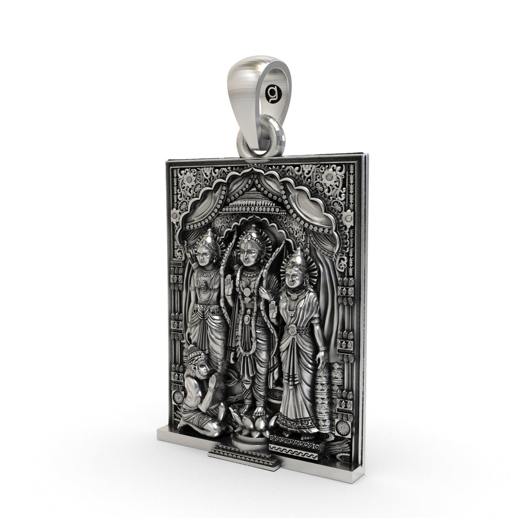 Close-up detail of the oxidized finish on the handcrafted silver Ram Darbar temple jewelry pendant.
