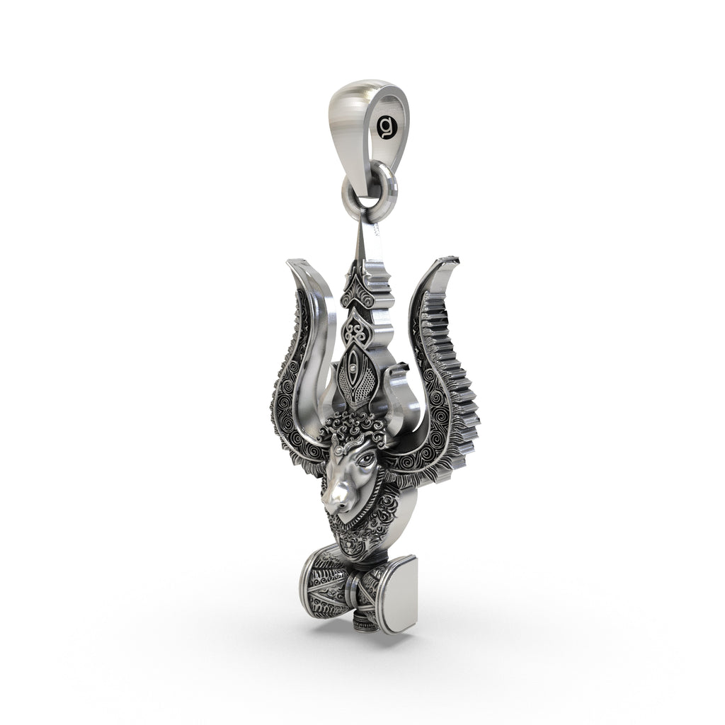 Close-up detail of the pure sterling silver Nandi and Damru motifs on the spiritual Mahadev pendant.