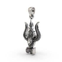 Close-up detail of the pure sterling silver Nandi and Damru motifs on the spiritual Mahadev pendant.