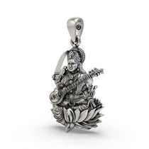 Close-up detail of the Raj Matangi sterling silver pendant highlighting the sacred wisdom motifs.