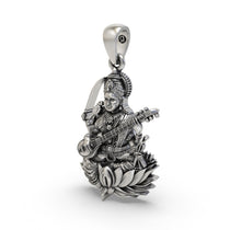 Beautifully styled Maa Matangi 925 silver pendant resting gracefully on a surface for spiritual seekers.
