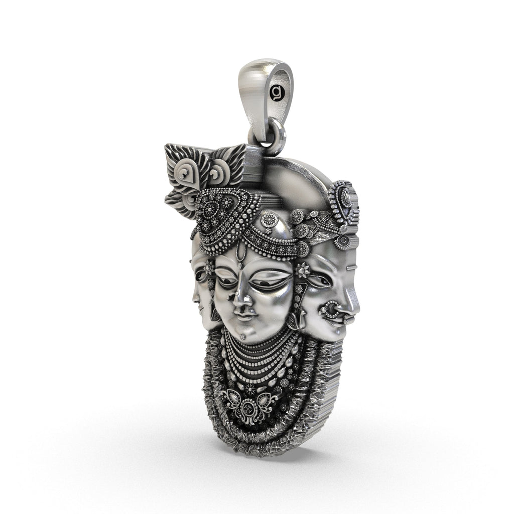 Close-up of the Three Face Krishna locket in 925 sterling silver highlighting traditional craftsmanship.