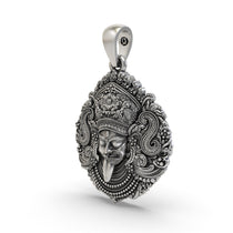 Close-up Kali Mata silver pendant detailing